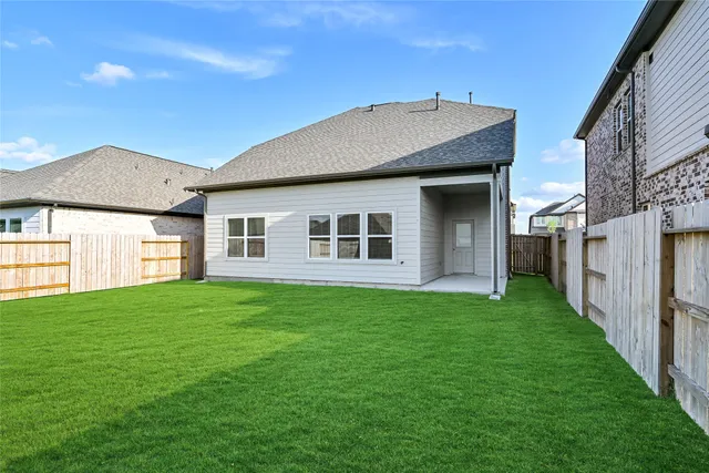 a house view with a garden space