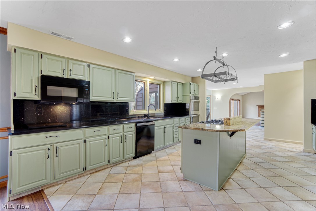 29329 Eddy Road Wickliffe, OH 44092 - Photo 8 of 50 Spacious kitchen with a new microwave, dishwasher, stove and oven.