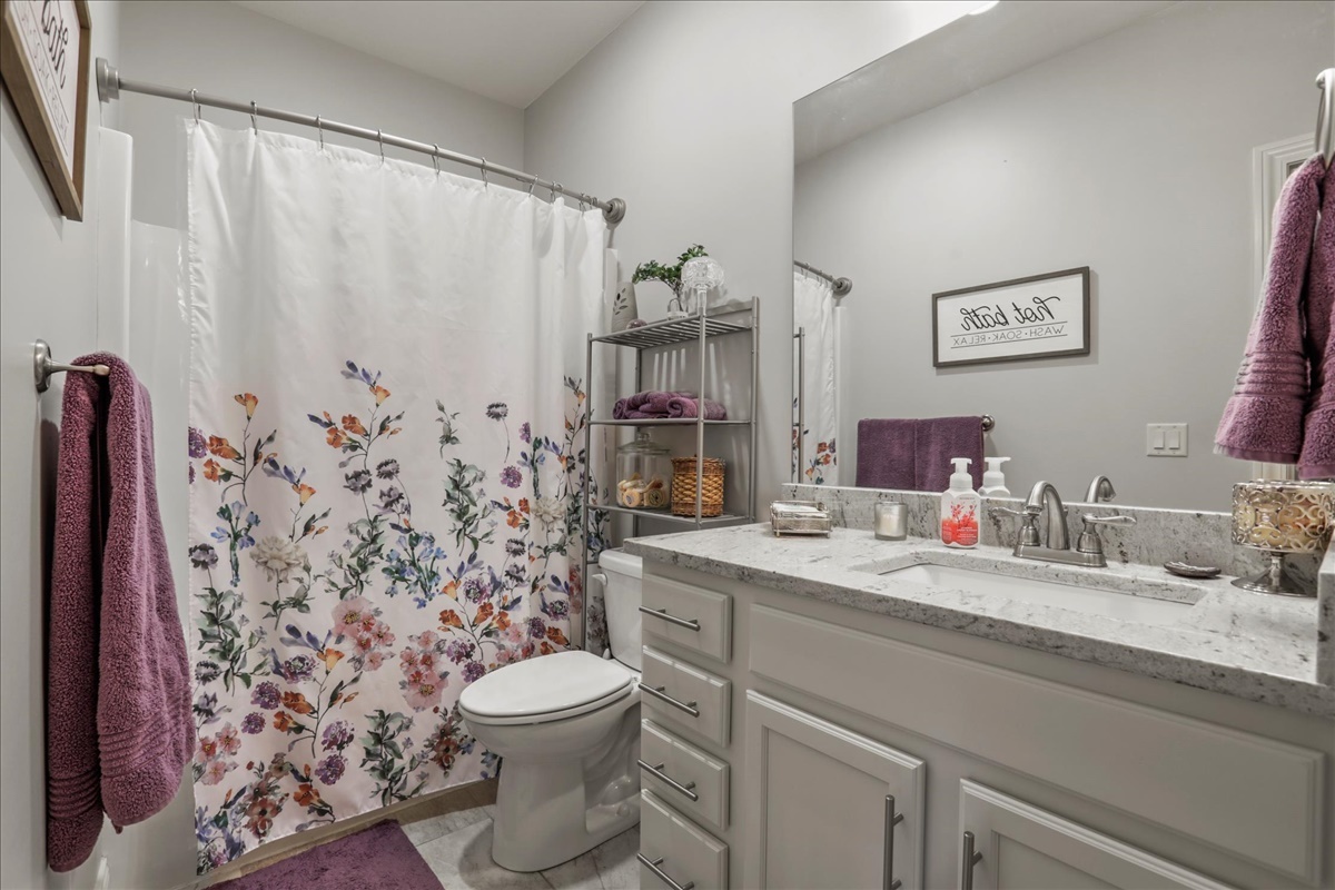 1604 Kassen Avenue Mahomet, IL 61853 - Photo 11 of 35 a bathroom with a granite countertop sink toilet and shower