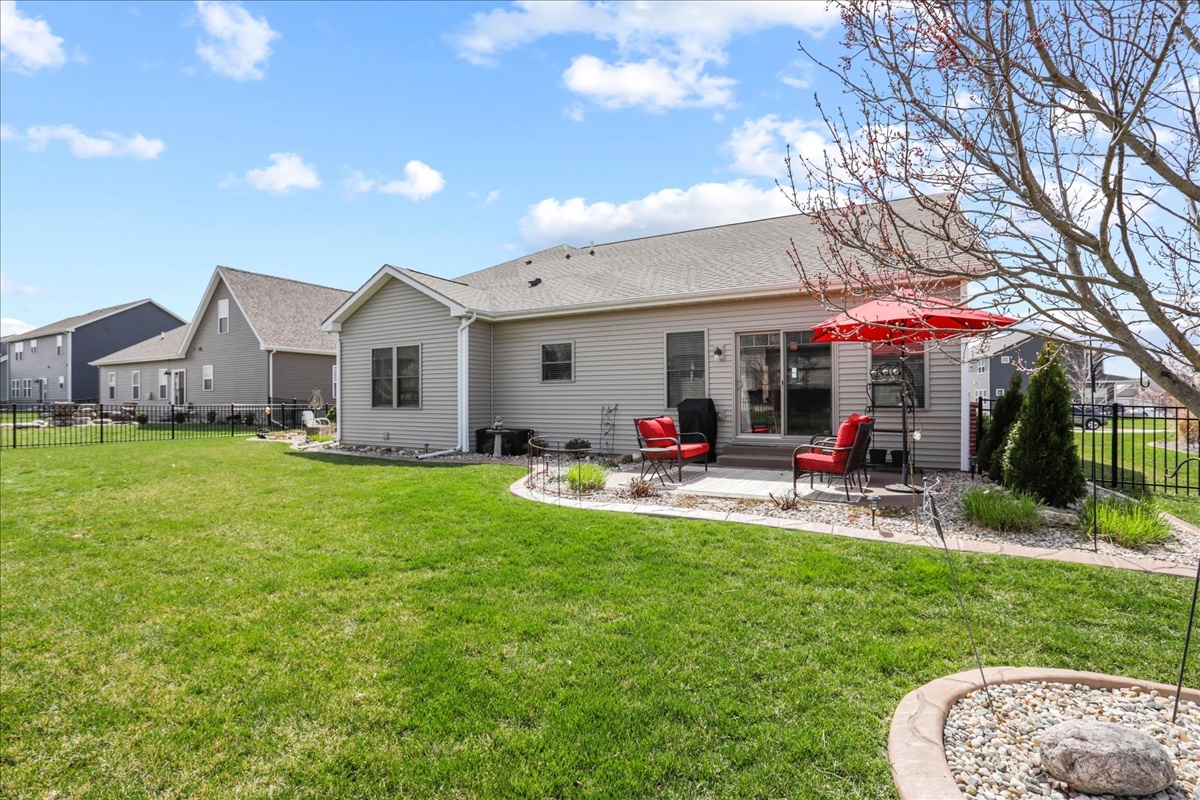 1604 Kassen Avenue Mahomet, IL 61853 - Photo 34 of 35 a view of a house with a yard porch and sitting area