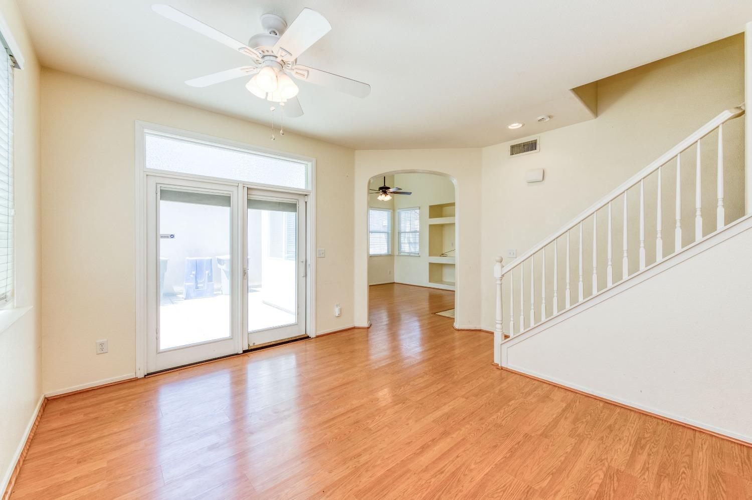 694 West Lisbon Lane Clovis, CA 93619 - Photo 16 of 39 a view of an entryway with wooden floor