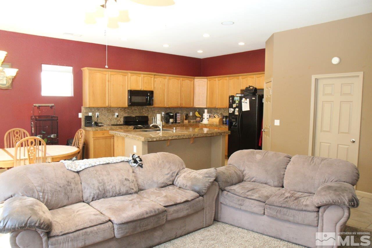 2550 Perryville Drive Reno, NV 89521 - Photo 5 of 30 a living room with furniture and a view of kitchen