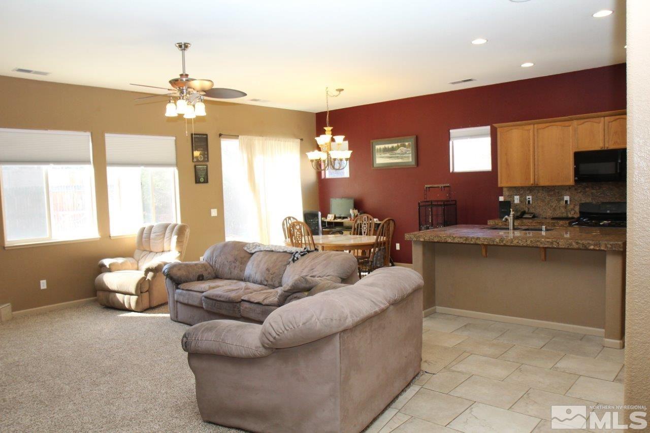 2550 Perryville Drive Reno, NV 89521 - Photo 6 of 30 a living room with furniture and a large window