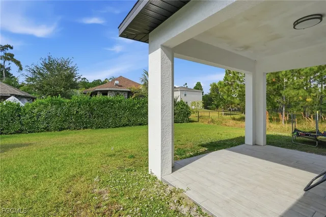 a view of a porch with a yard