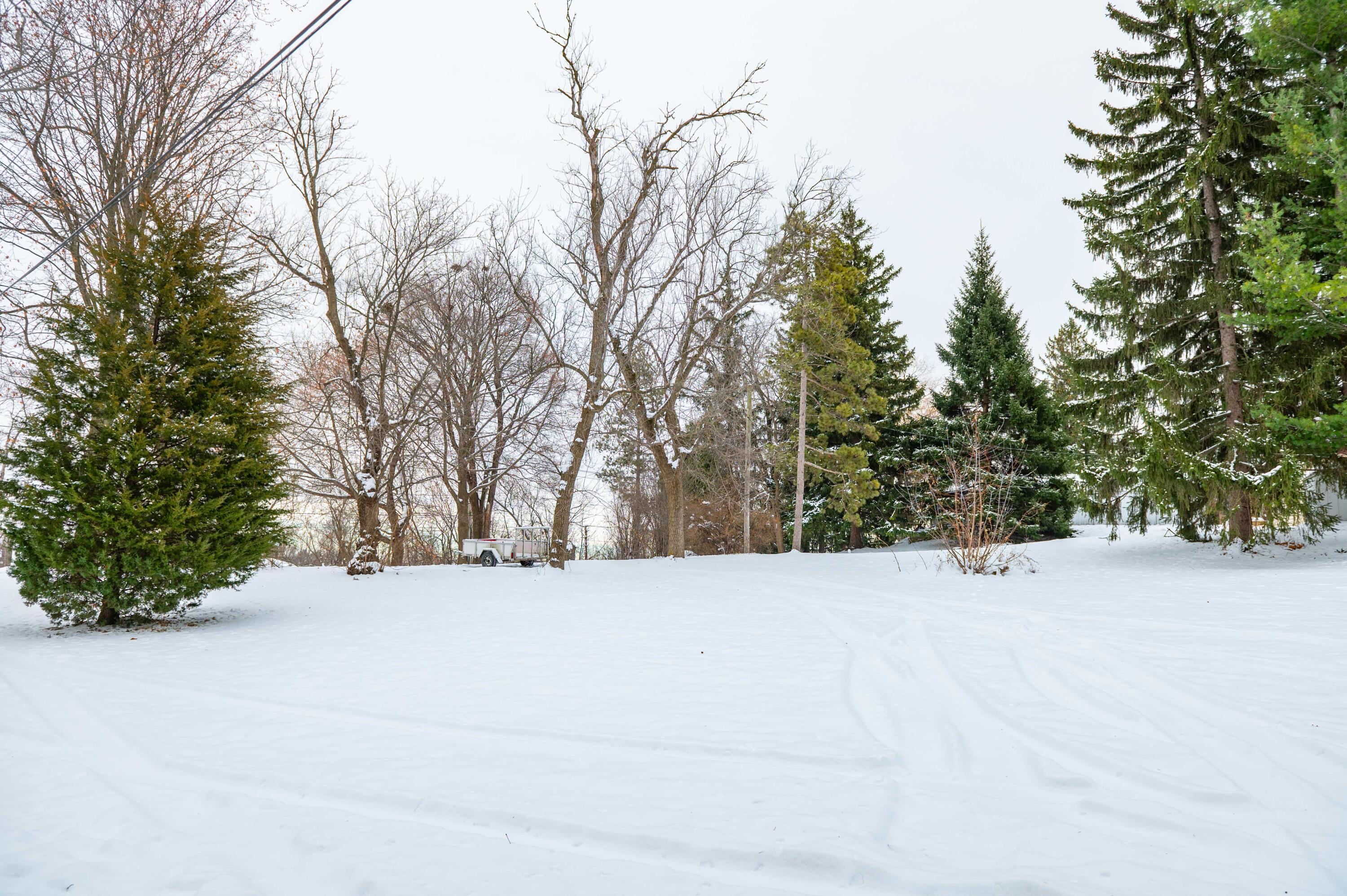 680 Brandt Court Pewaukee, WI 53072 - Photo 25 of 27 Back Yard