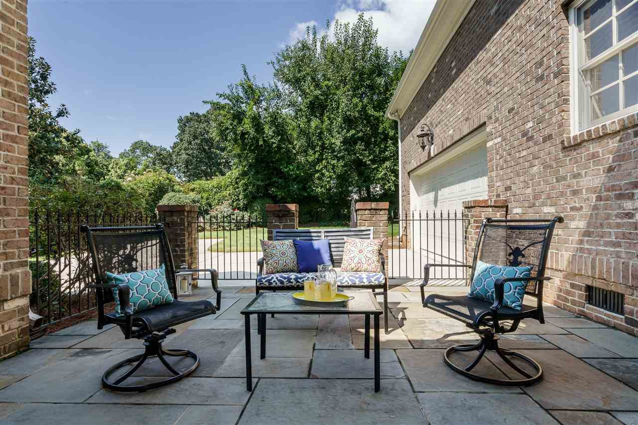 1315 Mayfair Road Raleigh, NC 27608 - Photo 21 of 25 ...has a bluestone slate floor, and opens to the Drop Zone/Mud Room and the Master Bedroom Patio with Wrought-Iron Fence