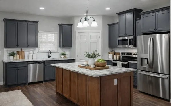 a kitchen with kitchen island granite countertop a sink refrigerator and microwave