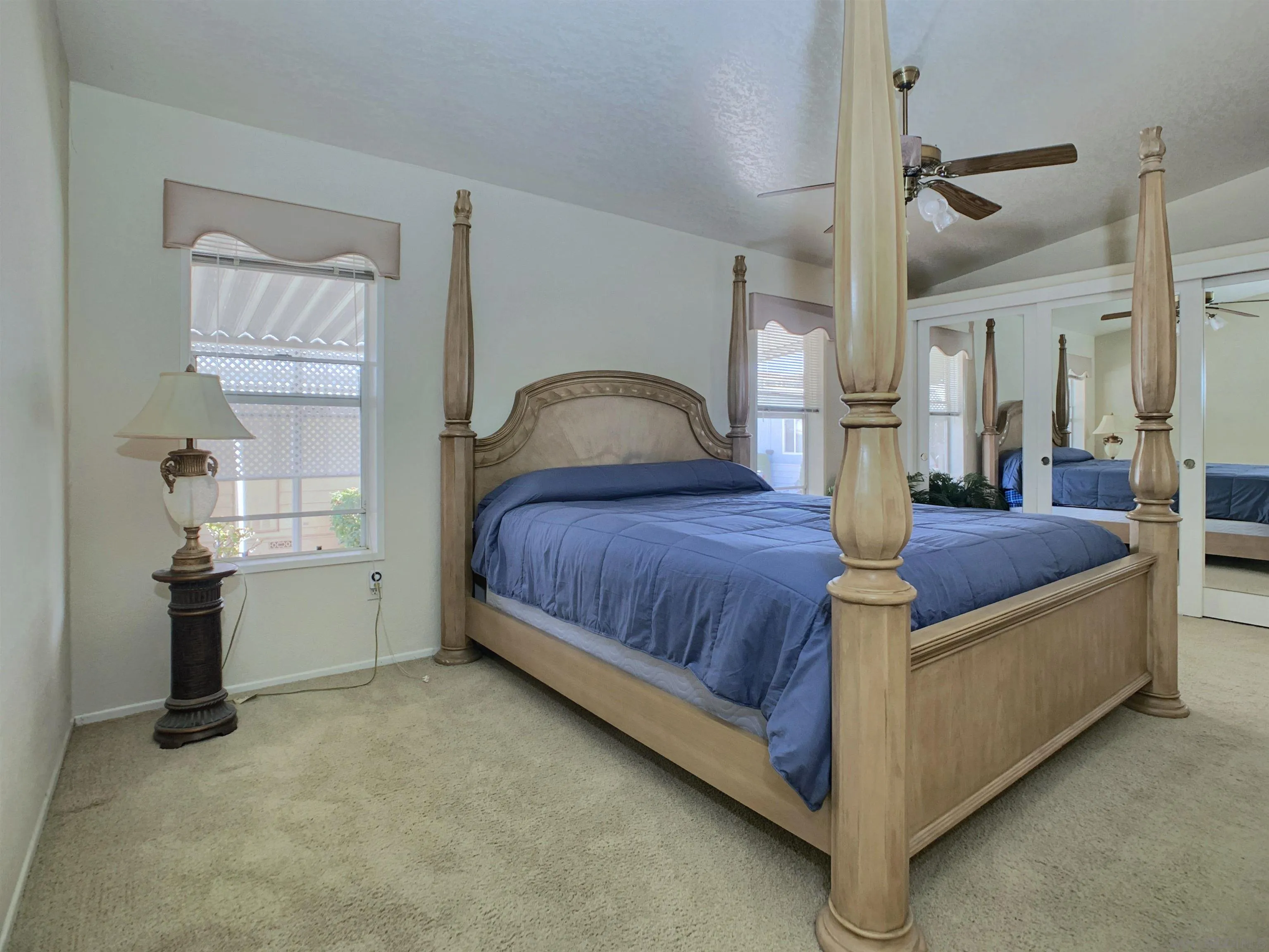 9500 Harritt Road, Unit SPC 25 Lakeside, CA 92040 - Photo 19 of 43 a bedroom with a bed and a cabinets