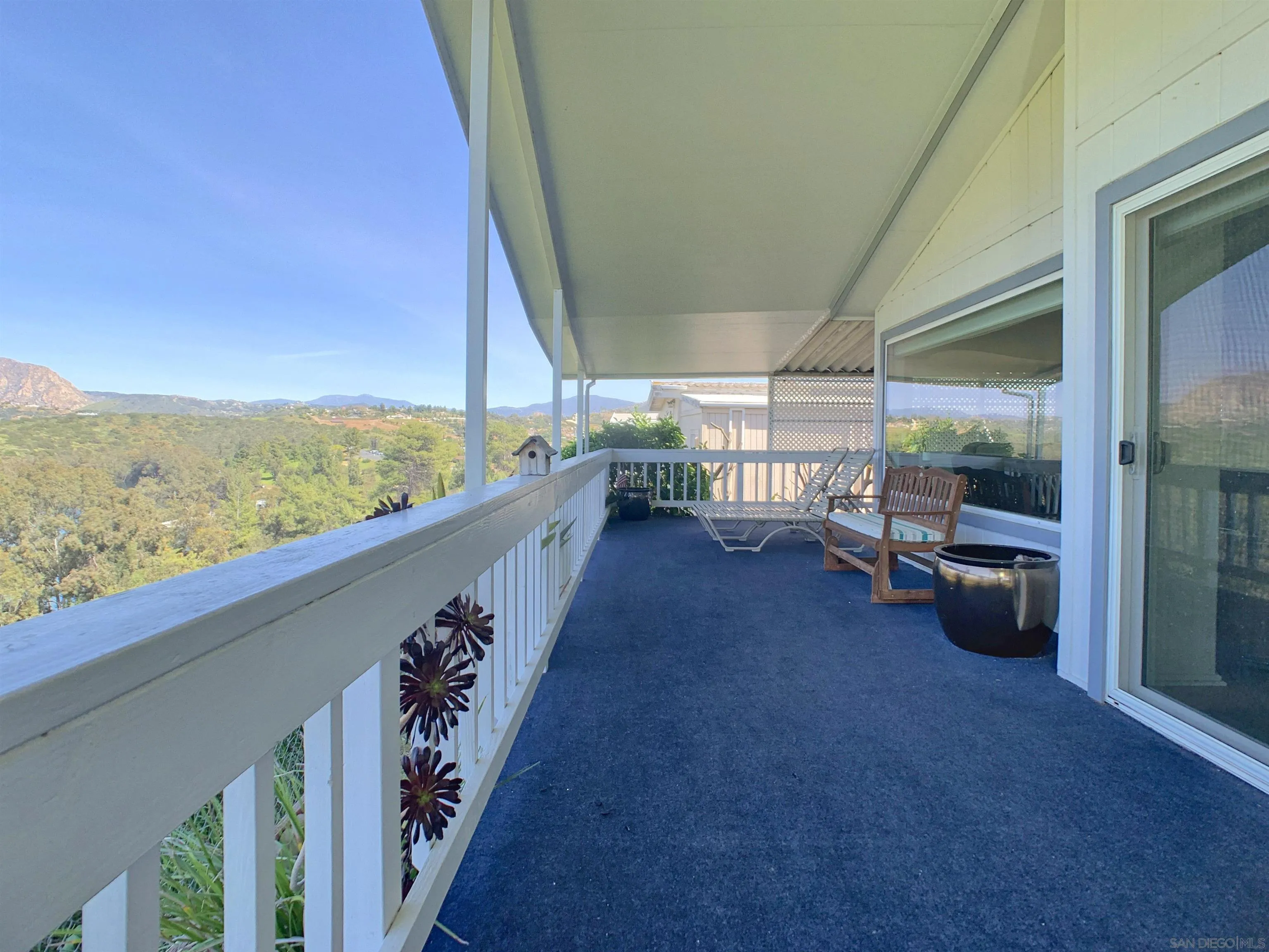9500 Harritt Road, Unit SPC 25 Lakeside, CA 92040 - Photo 2 of 43 a view of a balcony with chairs