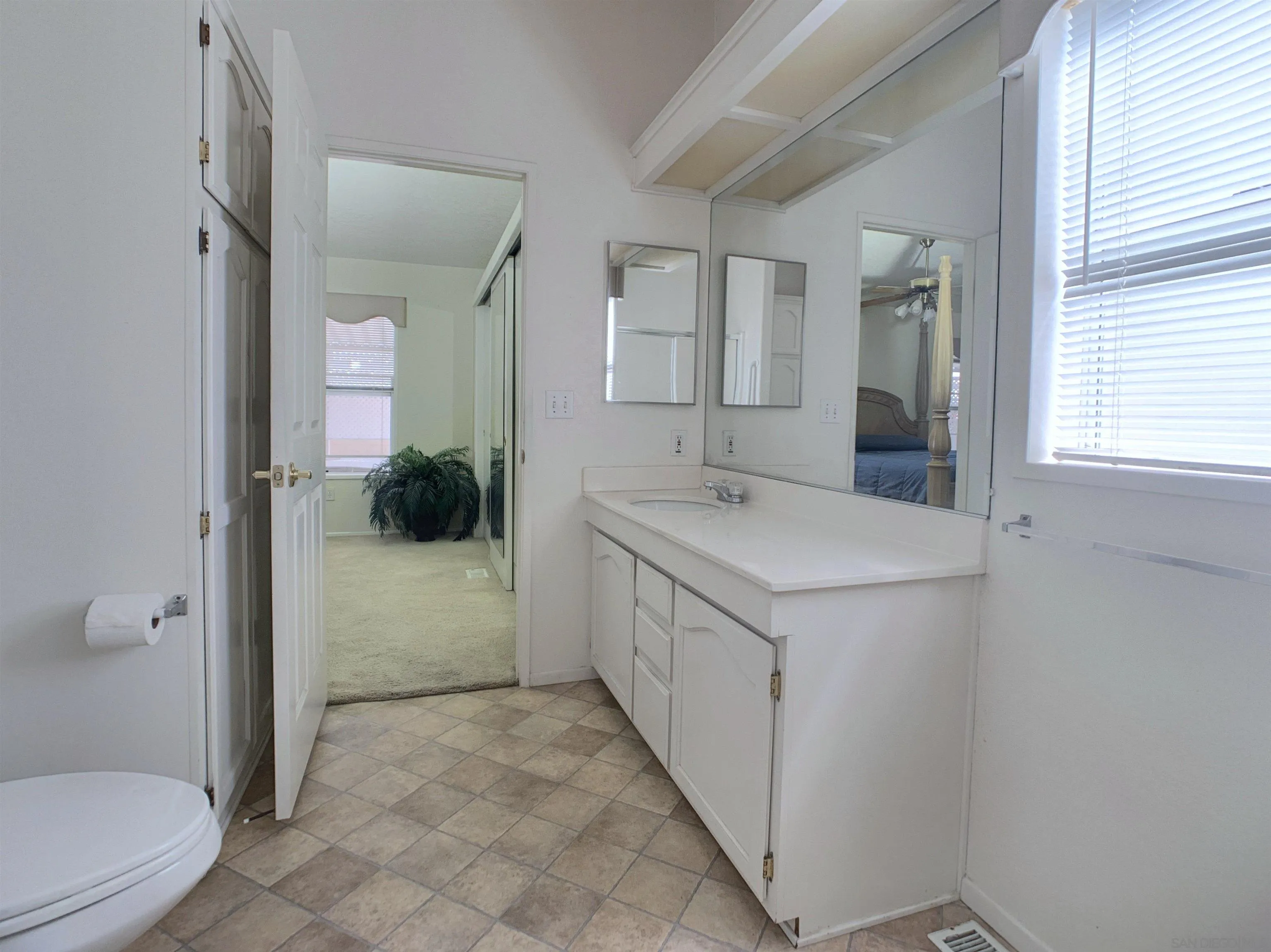 9500 Harritt Road, Unit SPC 25 Lakeside, CA 92040 - Photo 23 of 43 a bathroom with a sink a toilet and shower