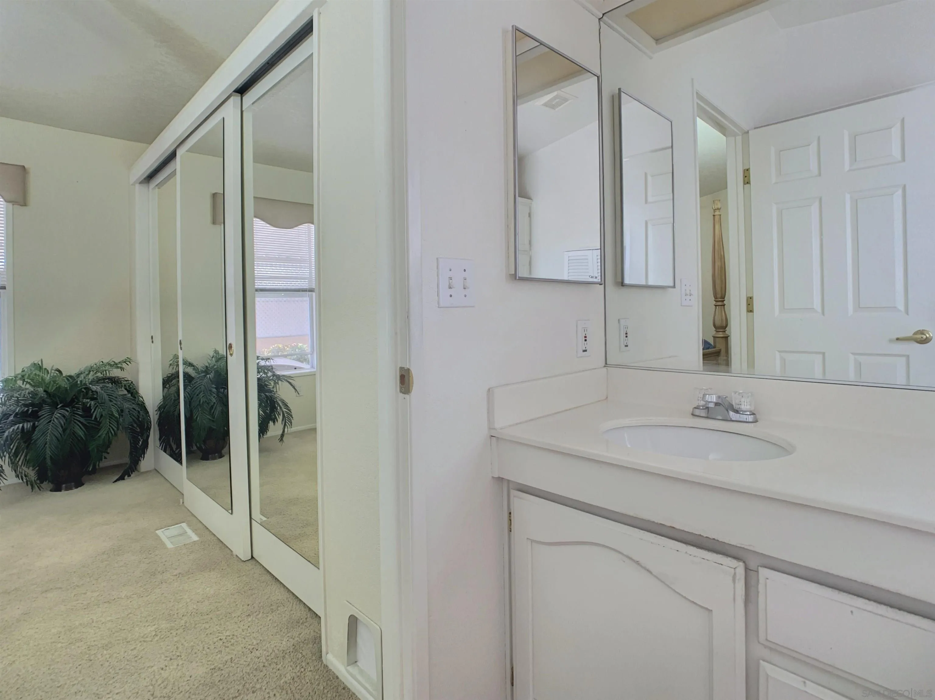 9500 Harritt Road, Unit SPC 25 Lakeside, CA 92040 - Photo 24 of 43 a bathroom with a sink and a mirror