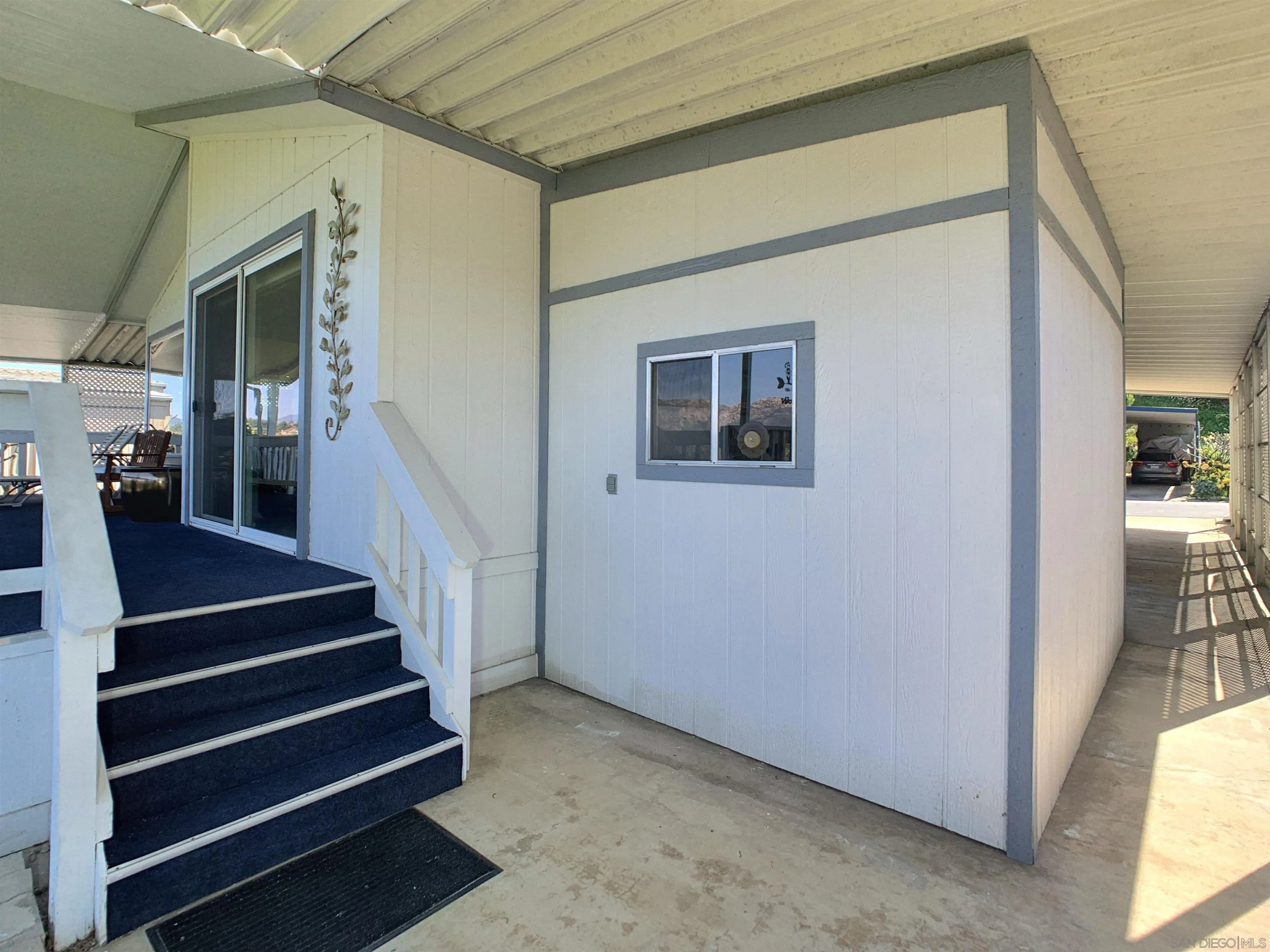 9500 Harritt Road, Unit SPC 25 Lakeside, CA 92040 - Photo 27 of 43 a view of entryway and hall with wooden floor