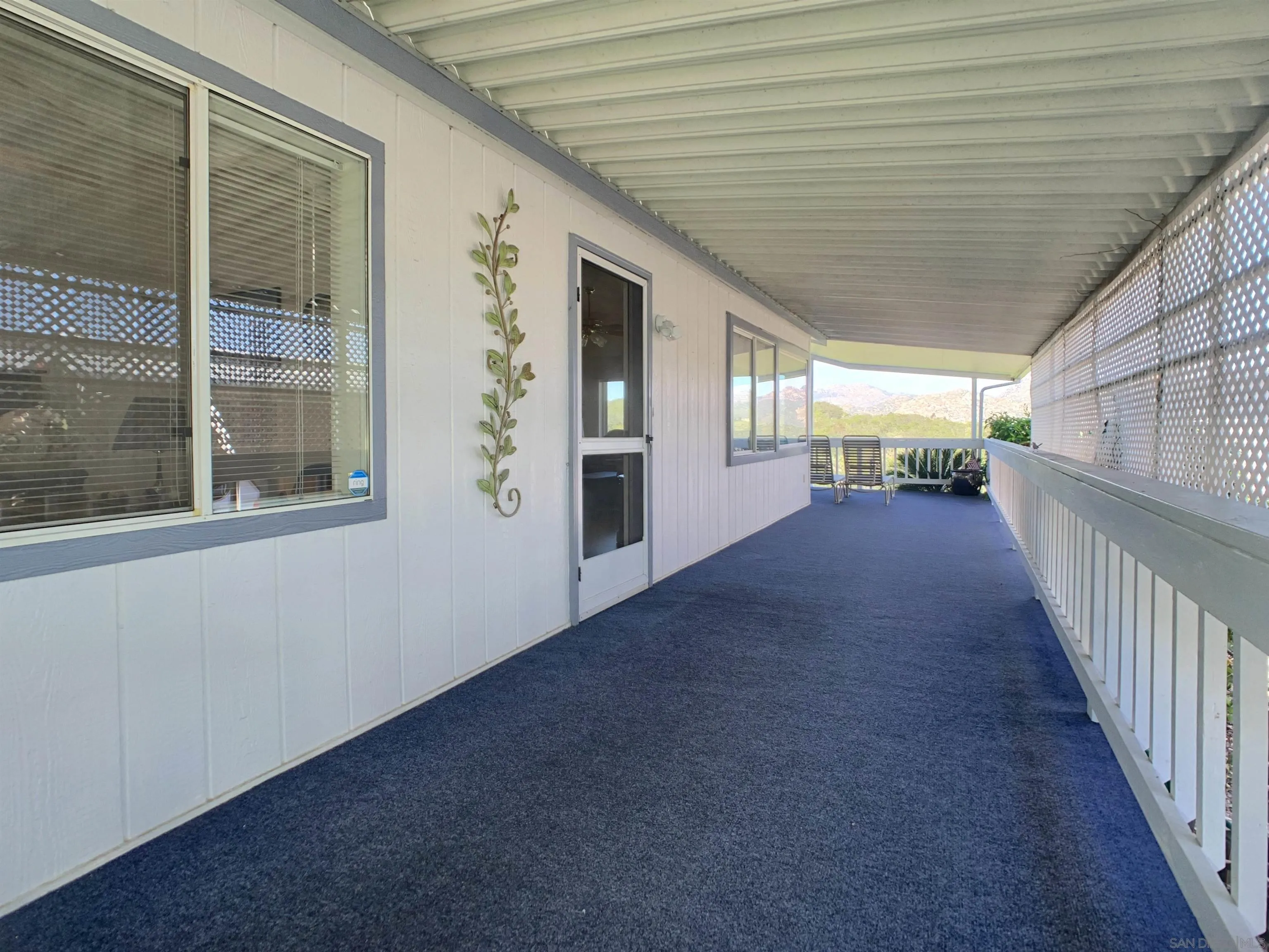 9500 Harritt Road, Unit SPC 25 Lakeside, CA 92040 - Photo 29 of 43 a view of a porch with wooden floor and stairs