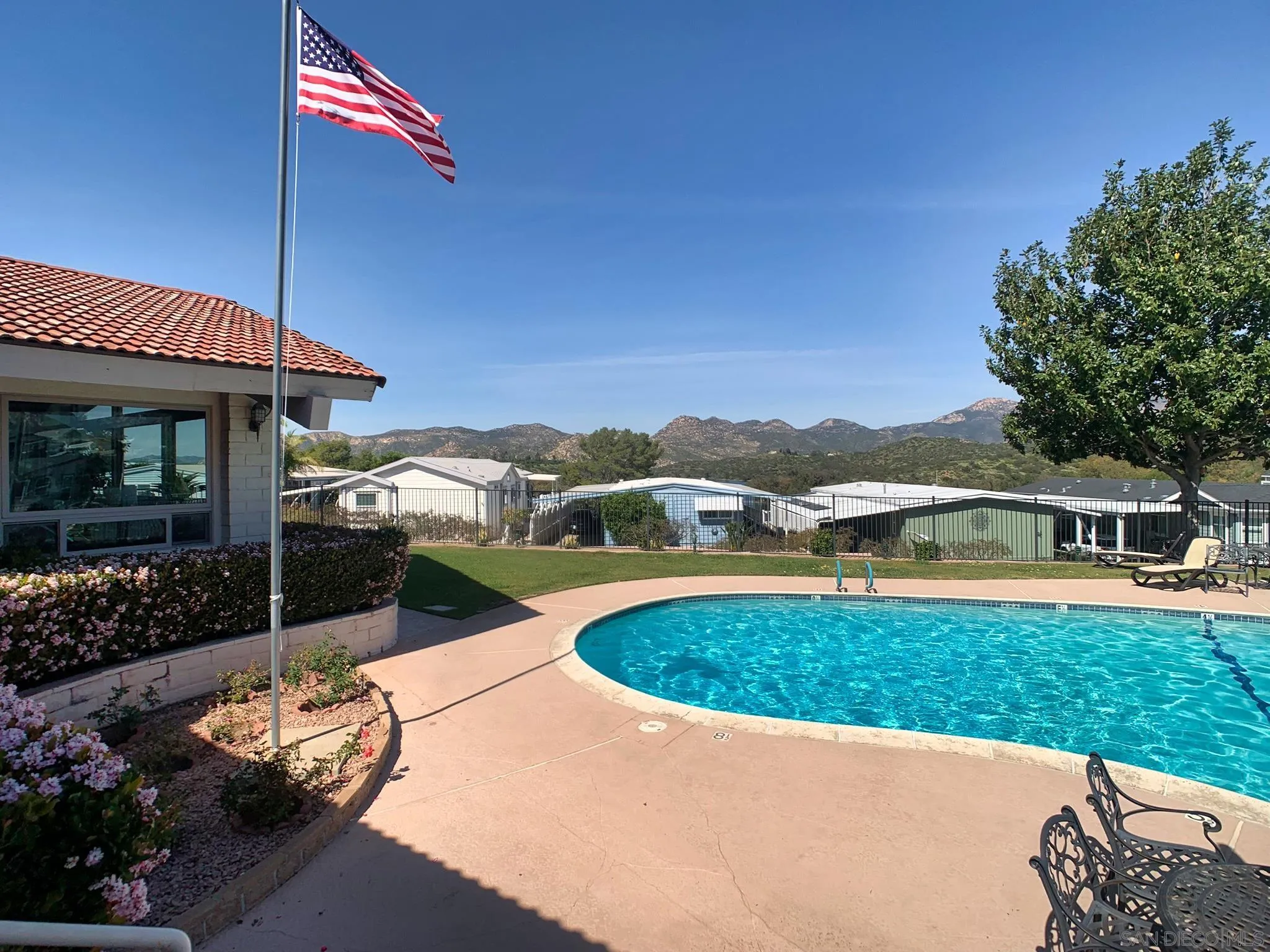 9500 Harritt Road, Unit SPC 25 Lakeside, CA 92040 - Photo 38 of 43 a view of a house with a swimming pool