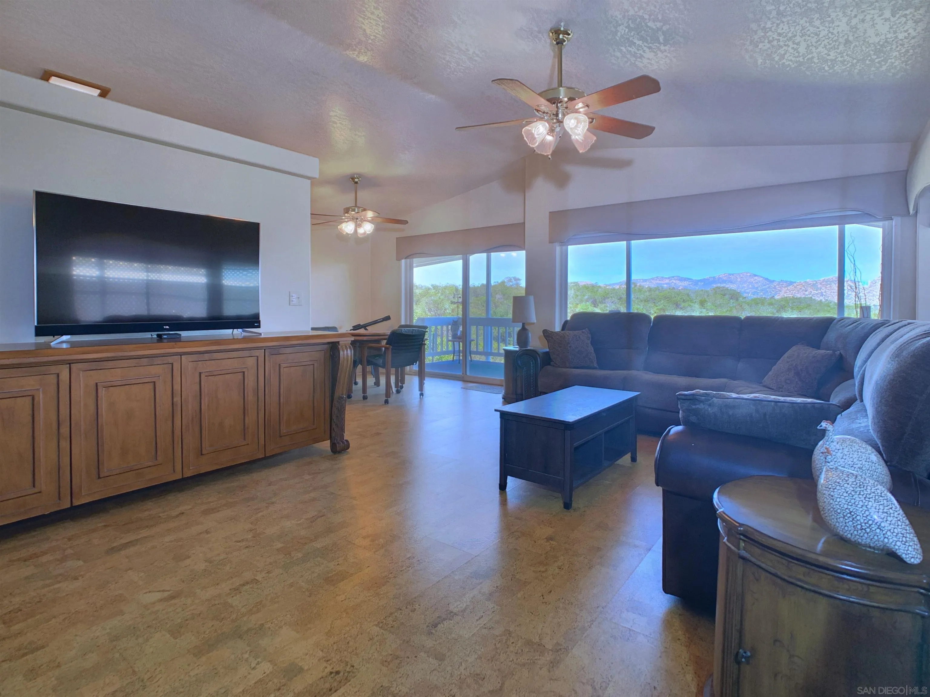 9500 Harritt Road, Unit SPC 25 Lakeside, CA 92040 - Photo 4 of 43 a living room with furniture and a large window