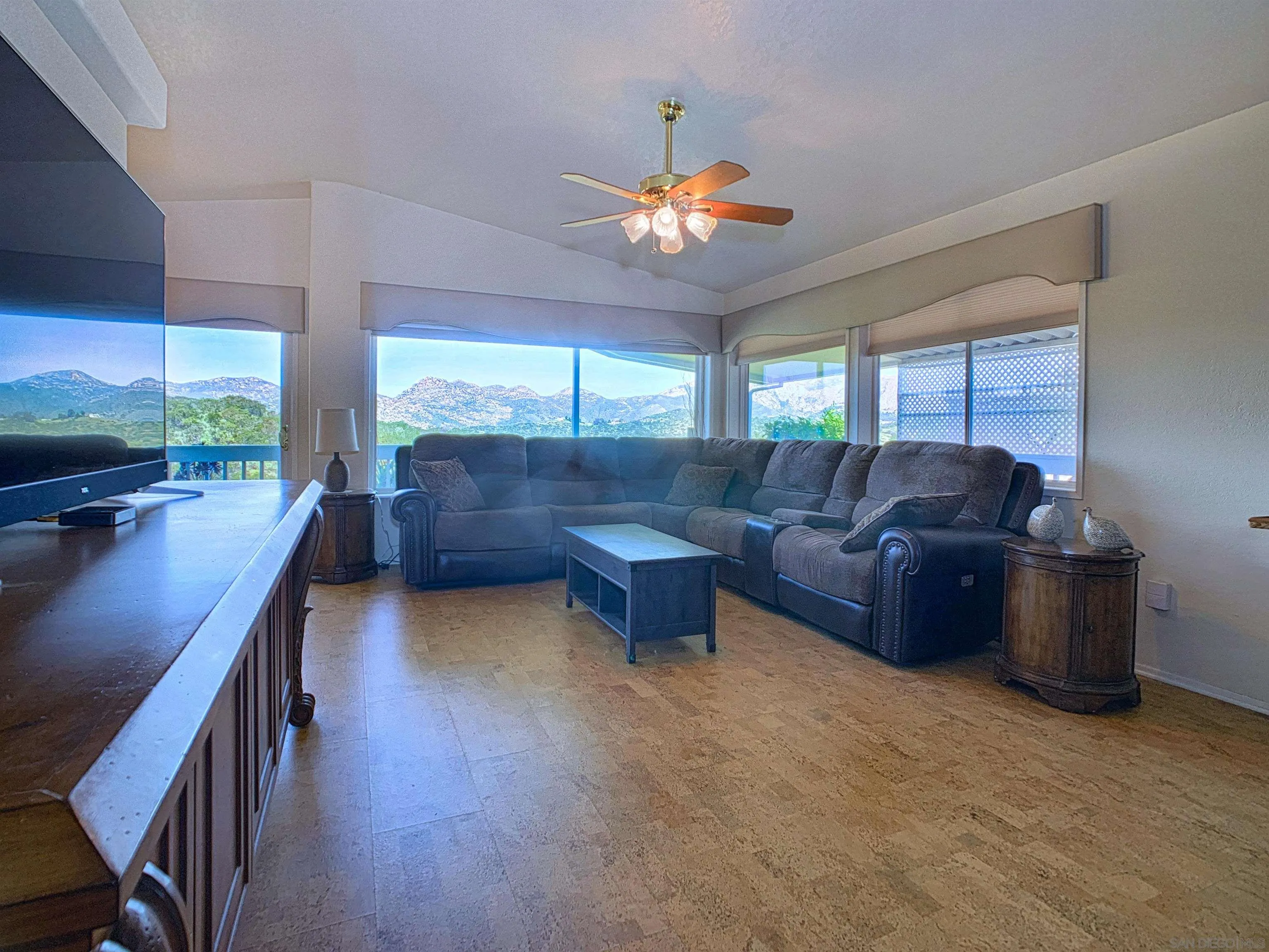 9500 Harritt Road, Unit SPC 25 Lakeside, CA 92040 - Photo 5 of 43 a living room with furniture and a large window