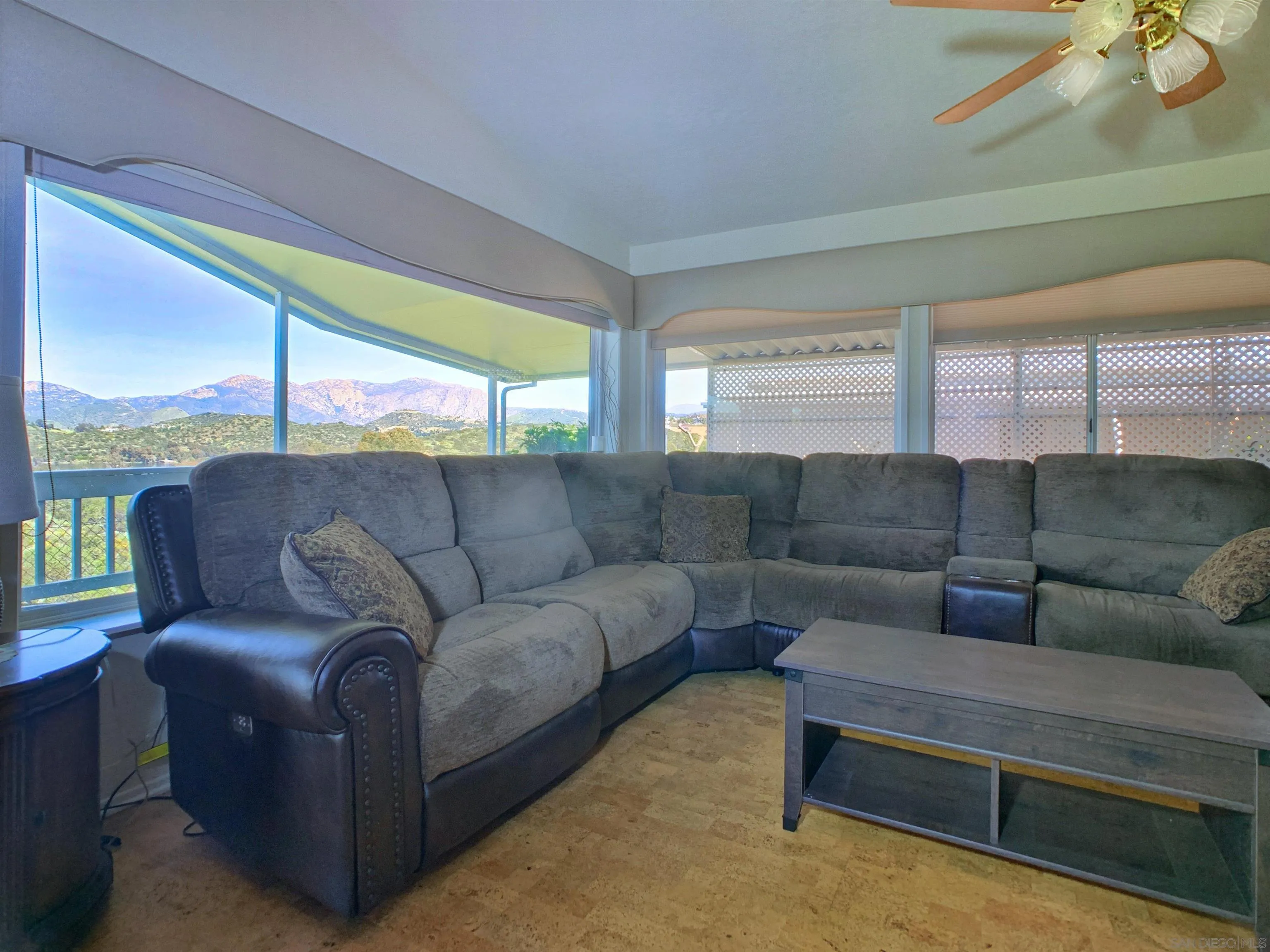 9500 Harritt Road, Unit SPC 25 Lakeside, CA 92040 - Photo 8 of 43 a living room with furniture and a large window