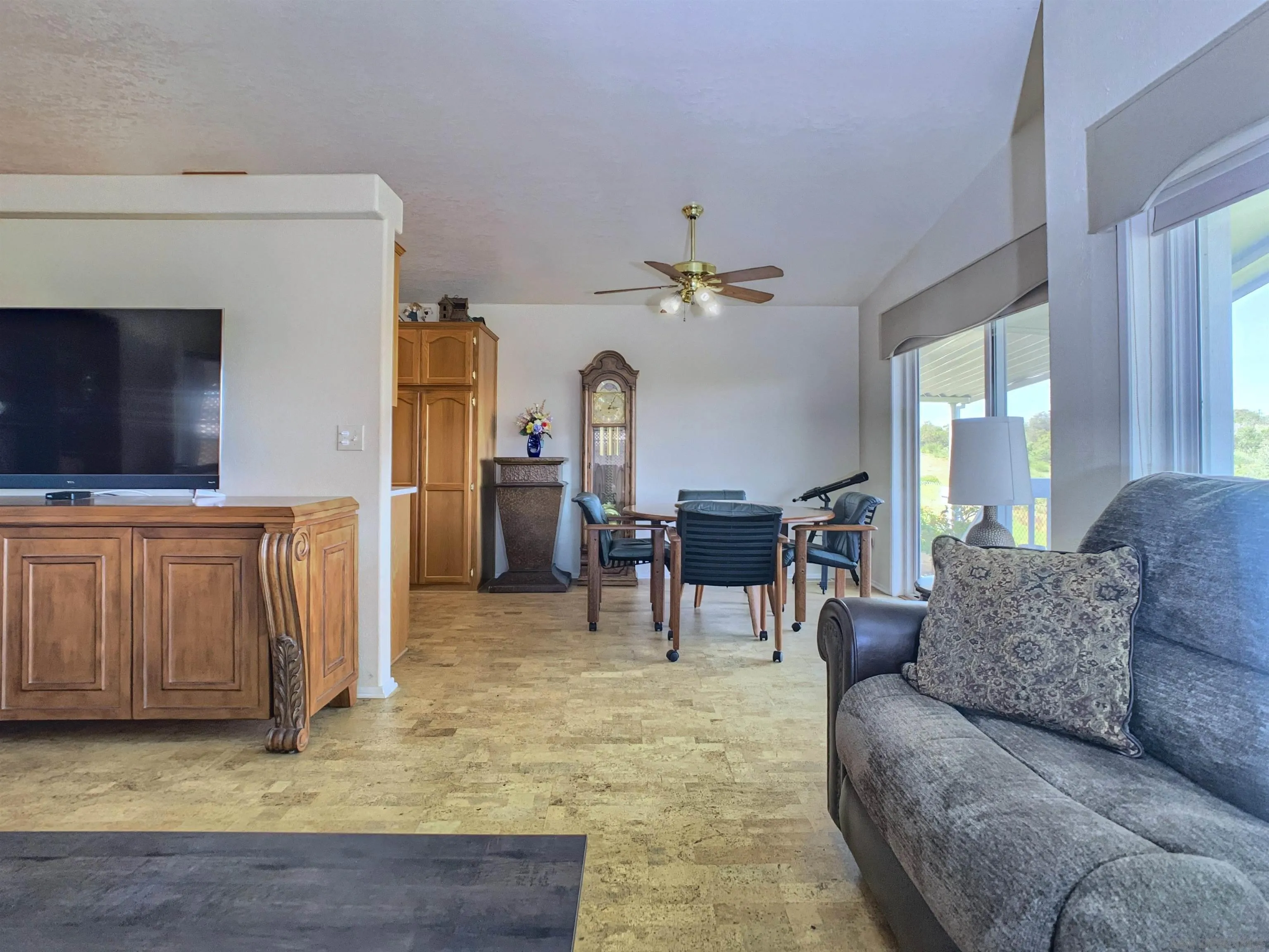 9500 Harritt Road, Unit SPC 25 Lakeside, CA 92040 - Photo 10 of 43 a living room with furniture and a flat screen tv