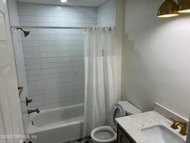 a bathroom with a sink and a tub