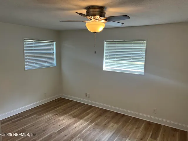a view of an empty room with window