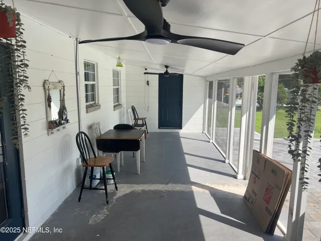 a view of a livingroom with furniture window and outside view