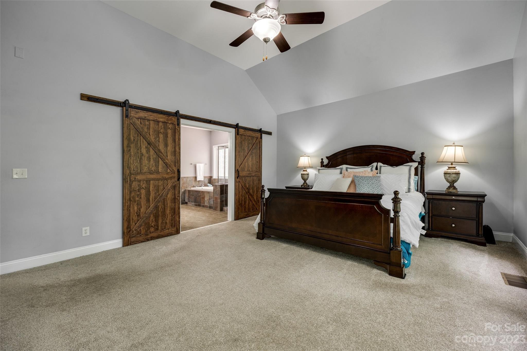 786 Fairway Point Drive Tega Cay, SC 29708 - Photo 16 of 39 a living room with furniture and a chandelier