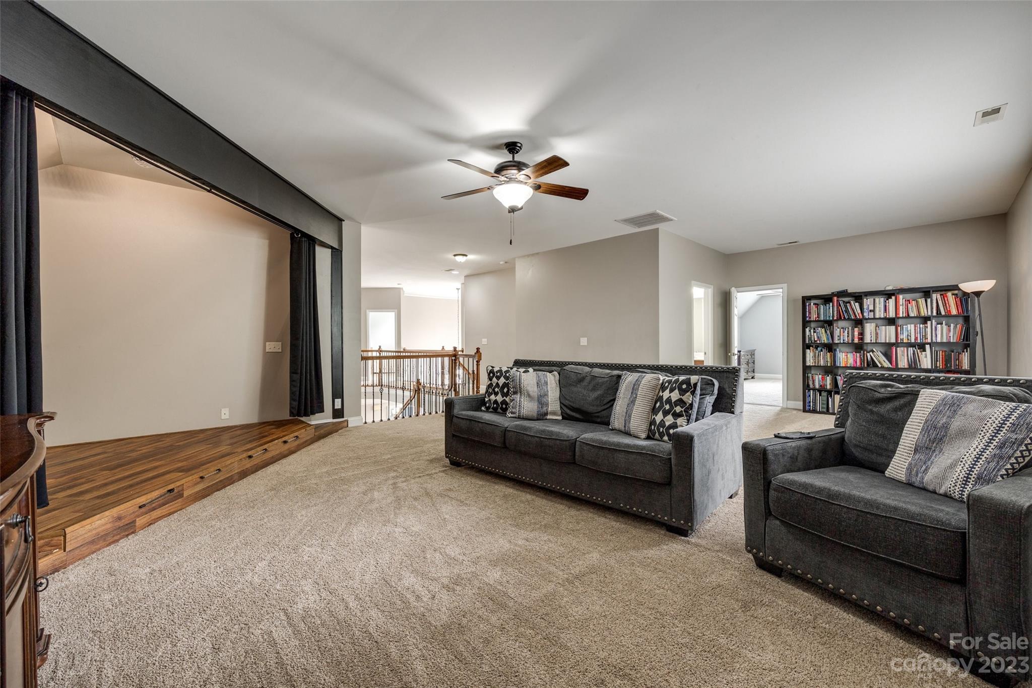 786 Fairway Point Drive Tega Cay, SC 29708 - Photo 19 of 39 a living room with furniture and a ceiling fan