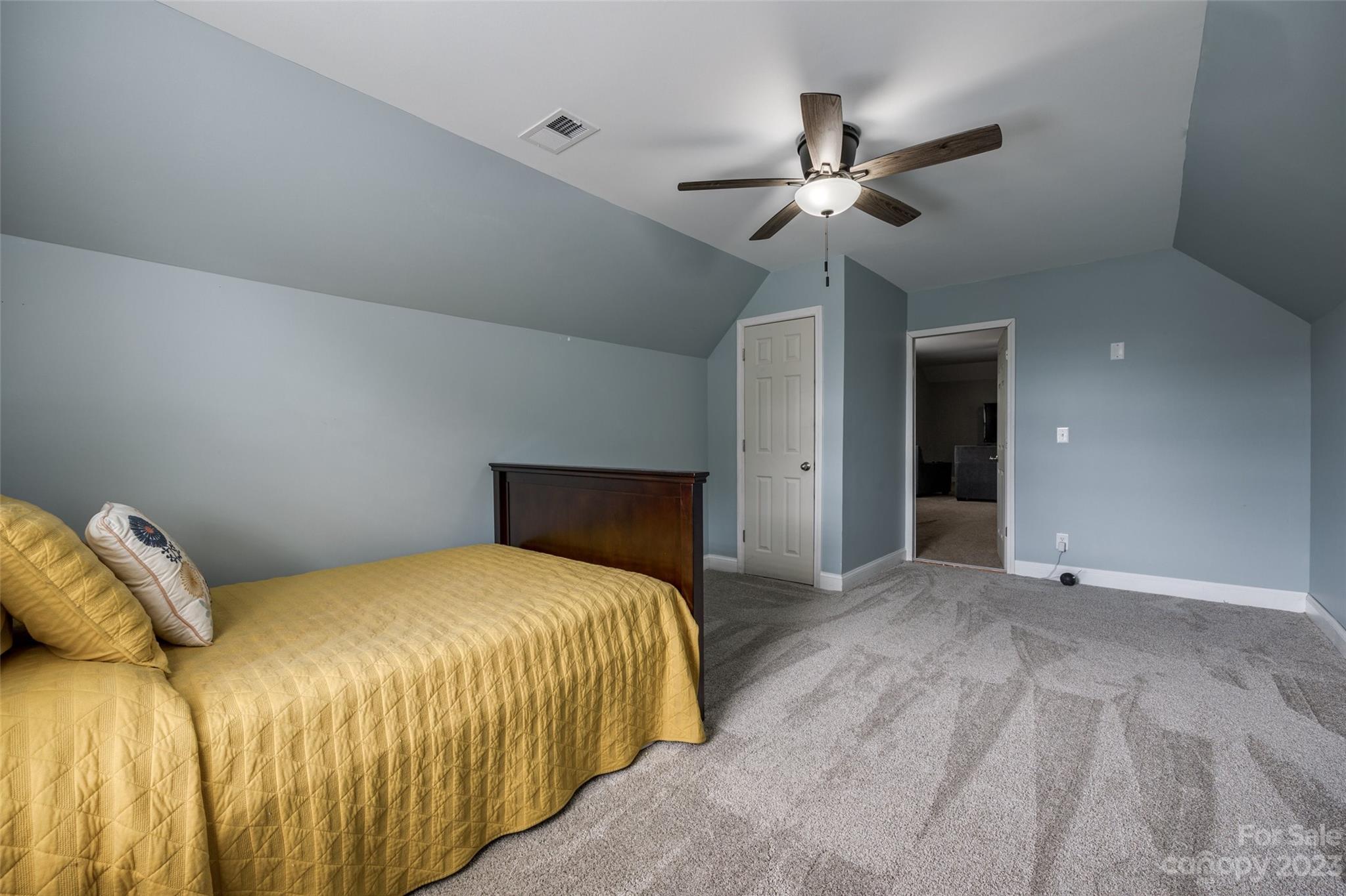 786 Fairway Point Drive Tega Cay, SC 29708 - Photo 20 of 39 a bedroom with a bed and a ceiling fan