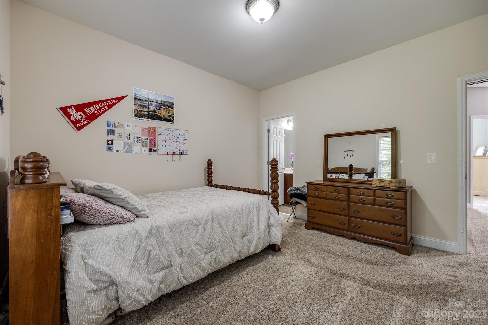 786 Fairway Point Drive Tega Cay, SC 29708 - Photo 24 of 39 a bed room with a bed and a couch