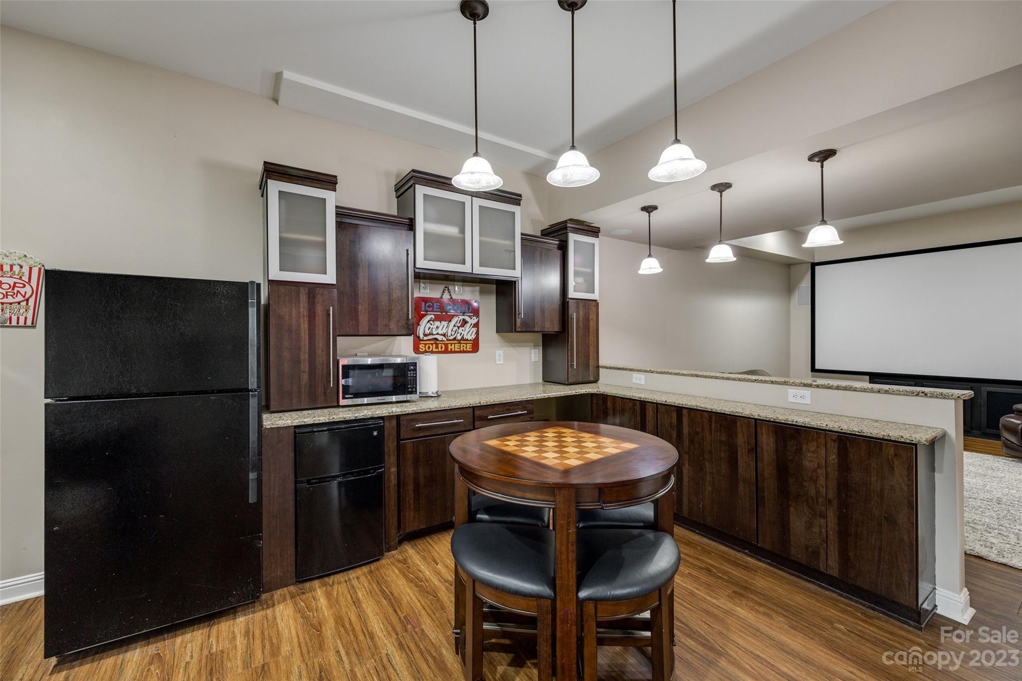 786 Fairway Point Drive Tega Cay, SC 29708 - Photo 27 of 39 a kitchen with a refrigerator a sink and a stove