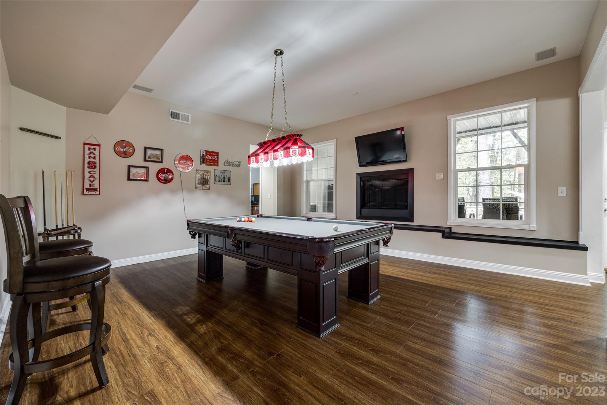 786 Fairway Point Drive Tega Cay, SC 29708 - Photo 29 of 39 a living room with furniture and a wooden floor