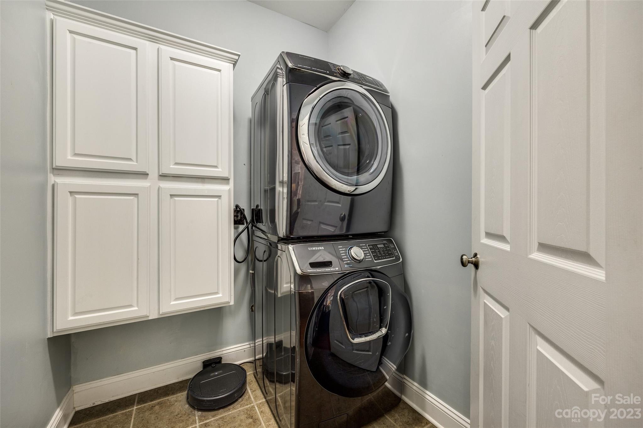 786 Fairway Point Drive Tega Cay, SC 29708 - Photo 32 of 39 a utility room with sink dryer and washer