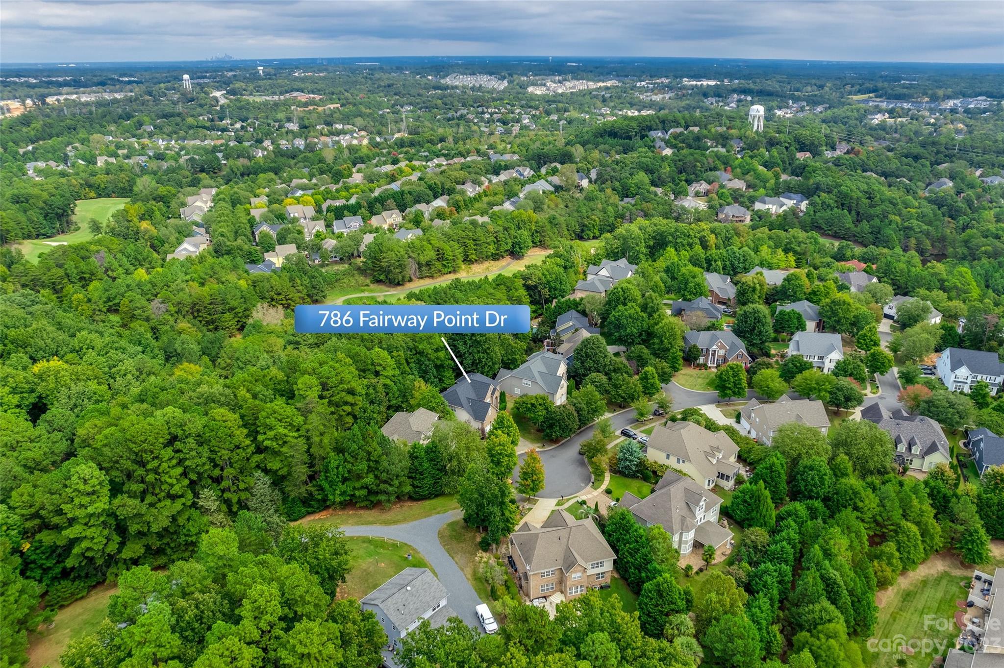 786 Fairway Point Drive Tega Cay, SC 29708 - Photo 39 of 39 a view of a city with lush green forest