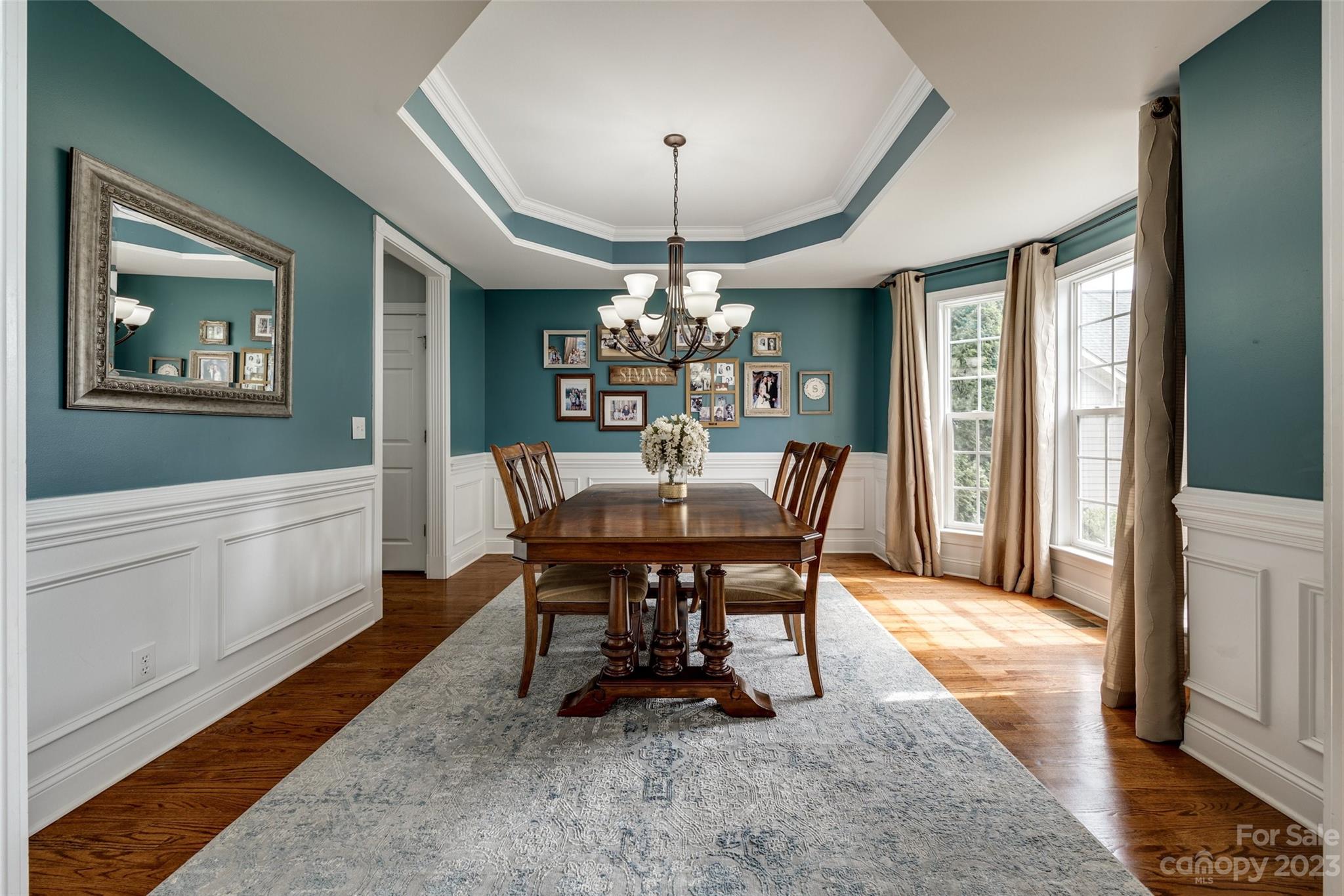 786 Fairway Point Drive Tega Cay, SC 29708 - Photo 5 of 39 a view of a dining room with furniture window and wooden floor