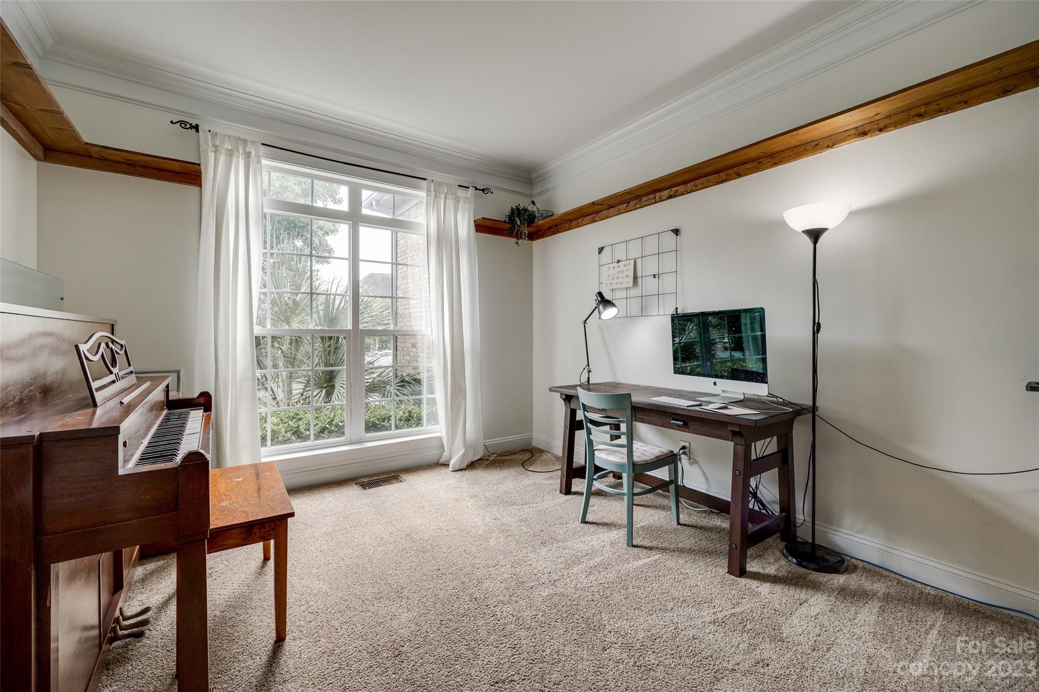 786 Fairway Point Drive Tega Cay, SC 29708 - Photo 7 of 39 a view of a workspace with furniture and a window