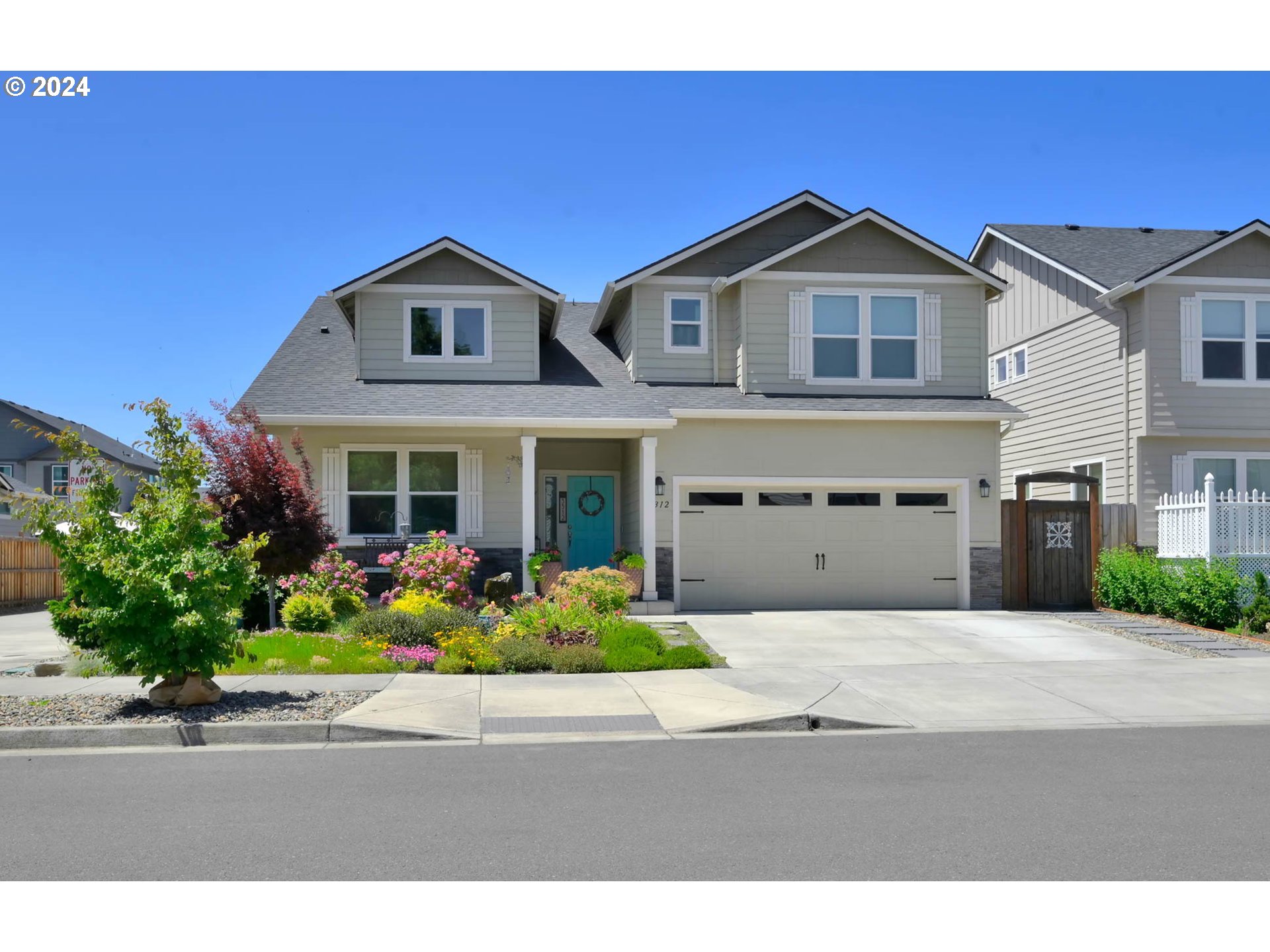 3312 Korbel Street Eugene, OR 97404 - Photo 1 of 48 a front view of a house with a yard
