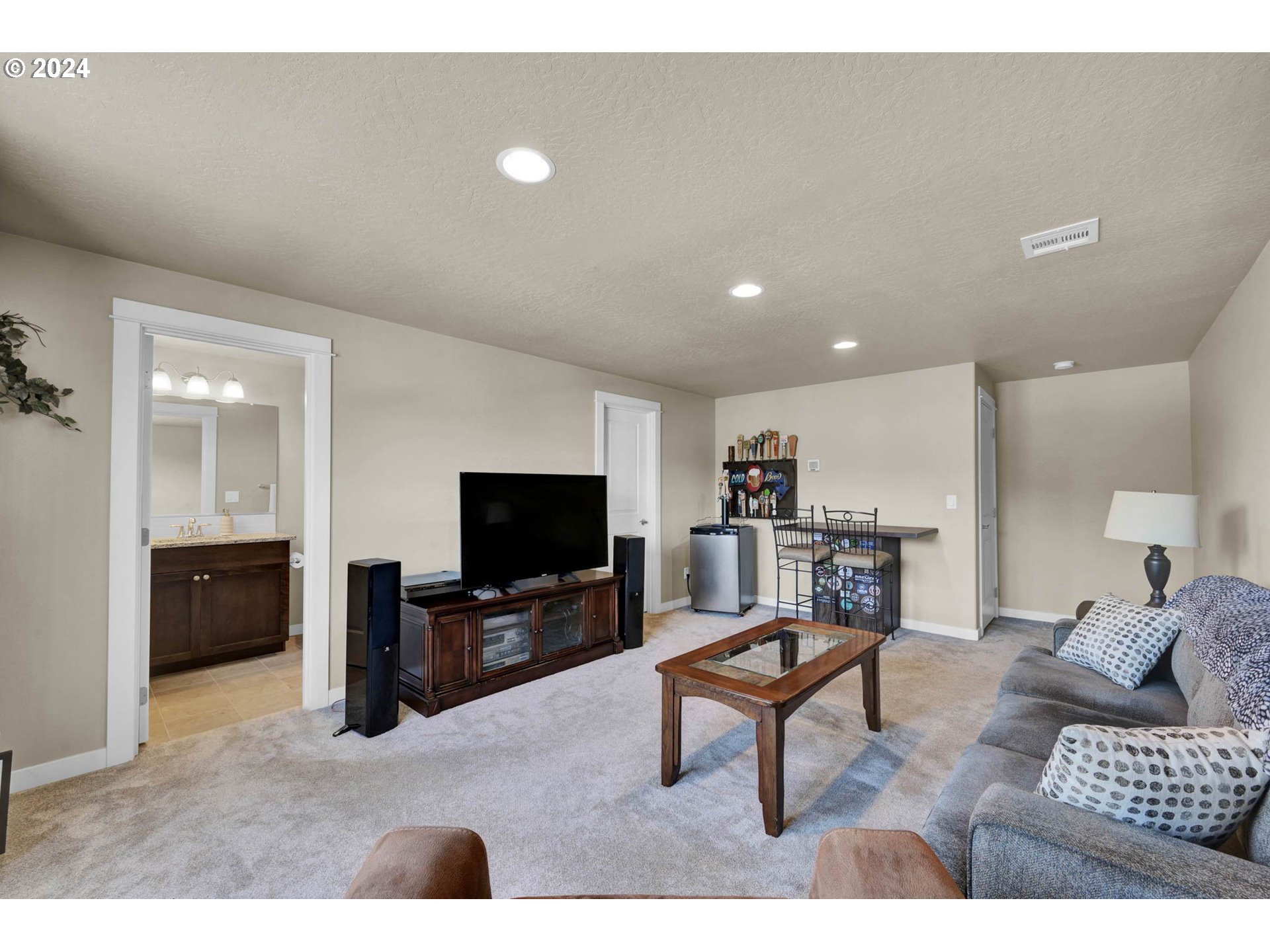 3312 Korbel Street Eugene, OR 97404 - Photo 37 of 48 a living room with furniture and a flat screen tv