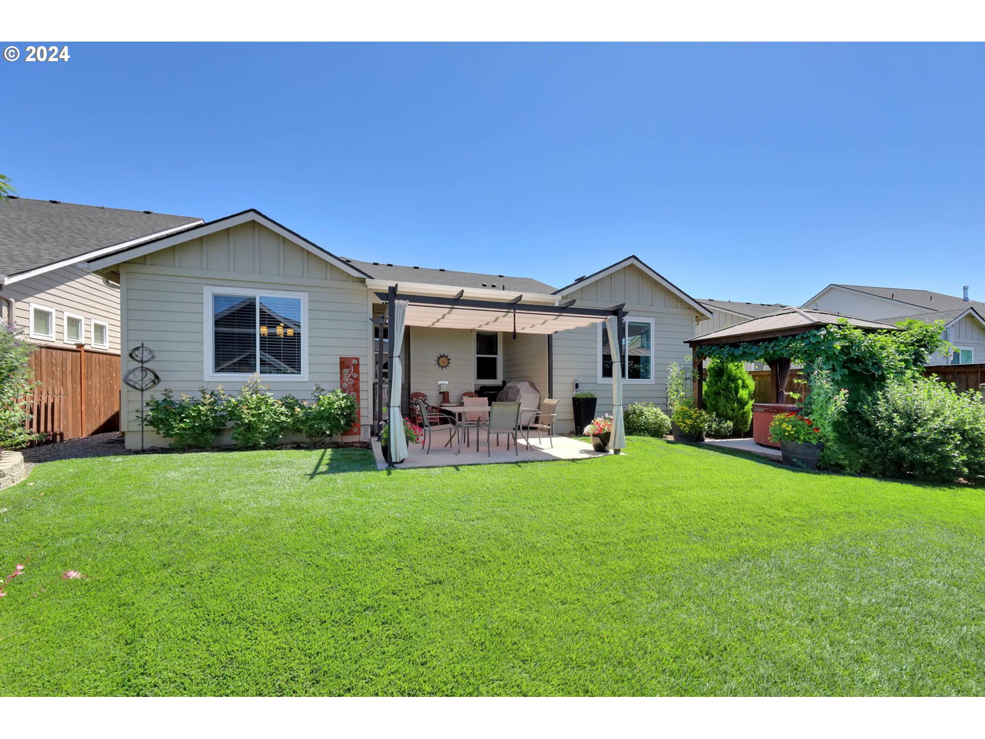 3312 Korbel Street Eugene, OR 97404 - Photo 43 of 48 a front view of a house with table and chairs