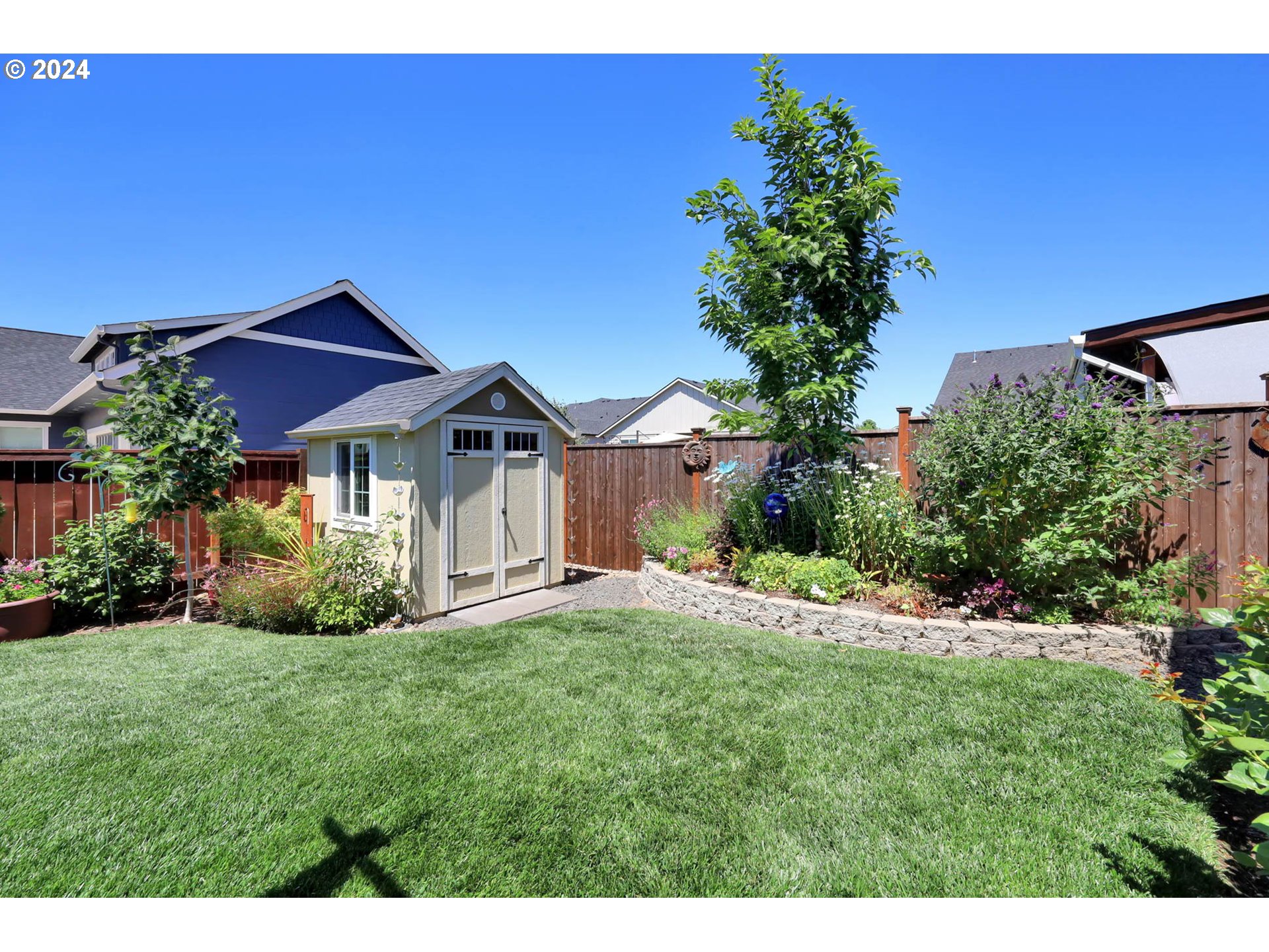 3312 Korbel Street Eugene, OR 97404 - Photo 44 of 48 a front view of a house with a yard