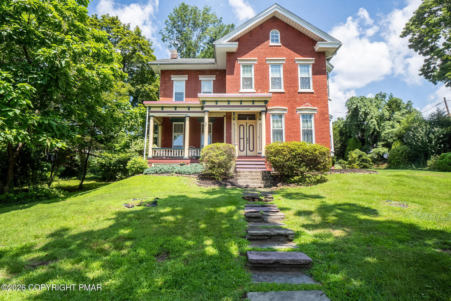 11 East Front Street Jim Thorpe, PA 18229 - Photo 1 of 63 a front view of a house with garden
