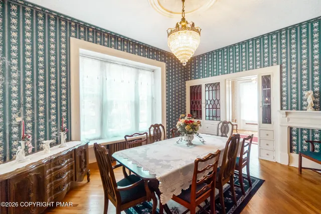 a view of a dining room with furniture