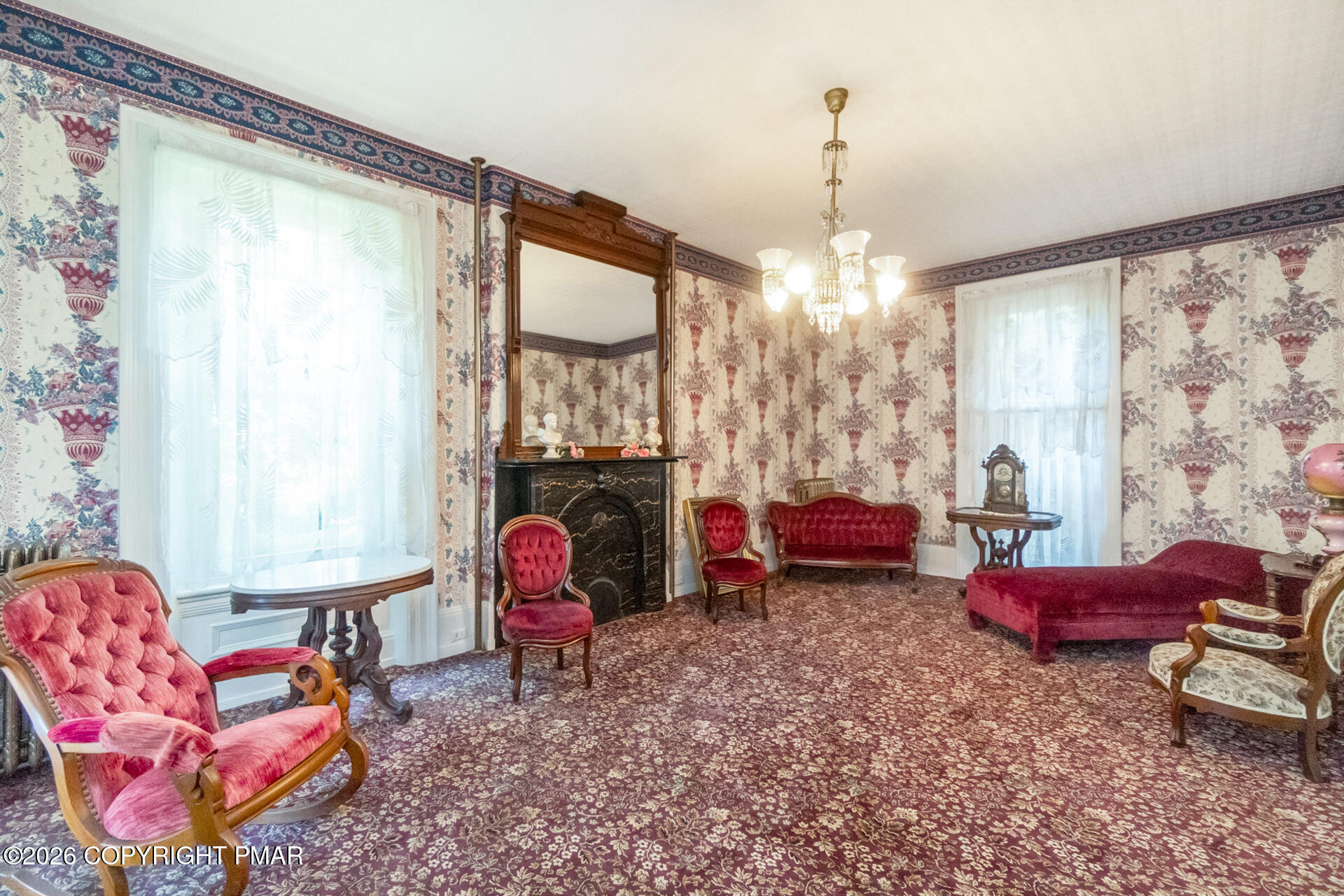 11 East Front Street Jim Thorpe, PA 18229 - Photo 17 of 63 a living room filled with furniture and a chandelier