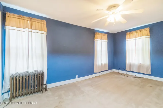 a bedroom with a bed and a cabinets