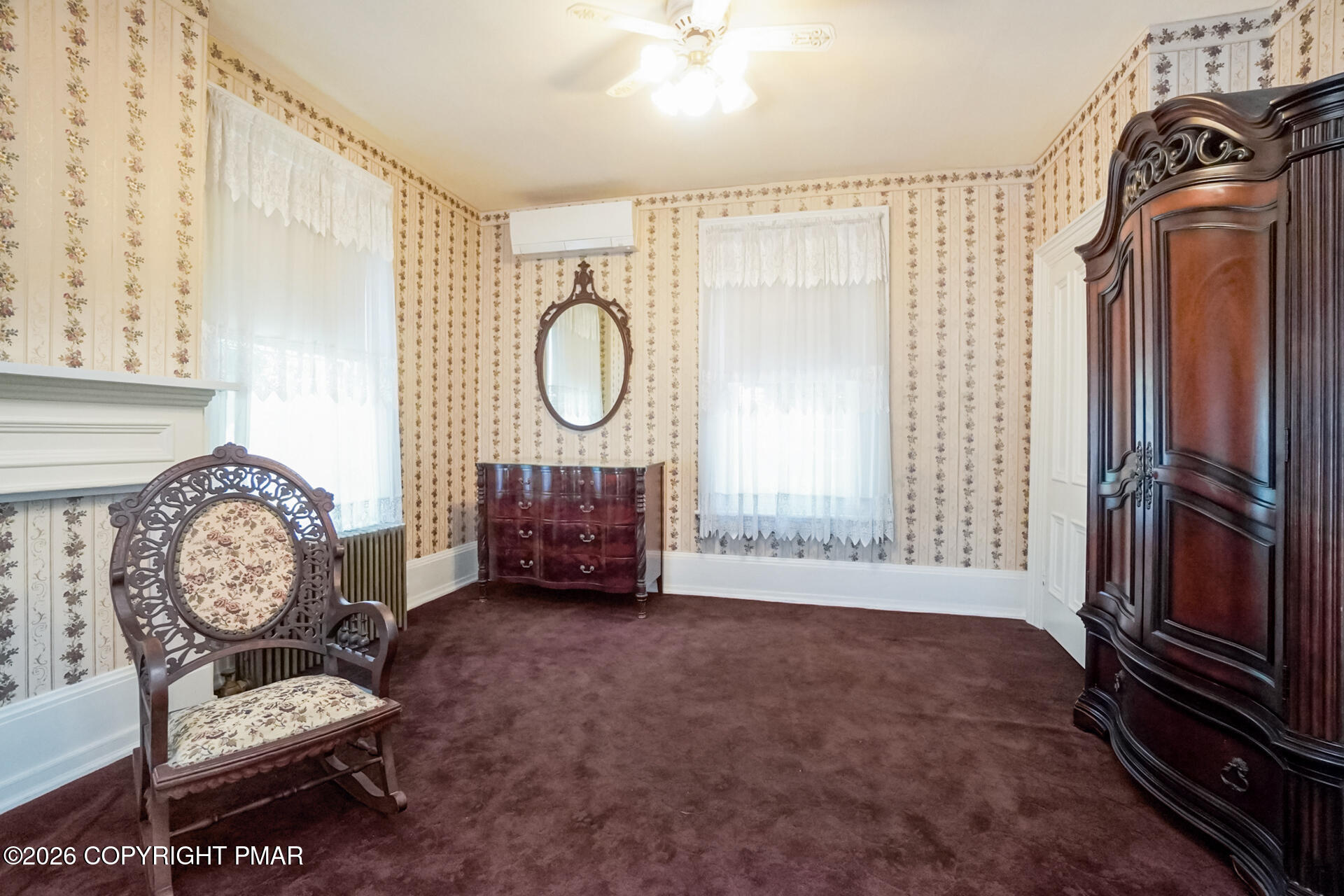 11 East Front Street Jim Thorpe, PA 18229 - Photo 48 of 63 a living room with furniture a window and a fireplace