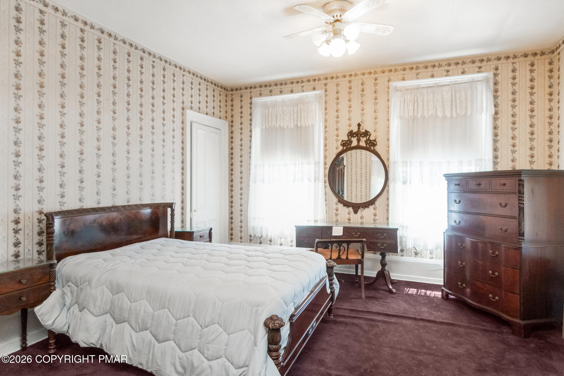 11 East Front Street Jim Thorpe, PA 18229 - Photo 50 of 63 a bedroom with a bed a dresser and chair