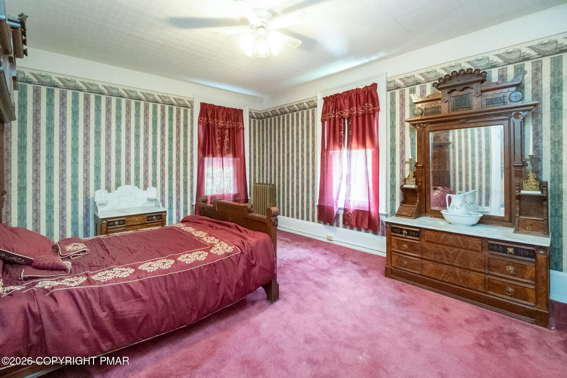 11 East Front Street Jim Thorpe, PA 18229 - Photo 56 of 63 a bedroom with a bed and large windows