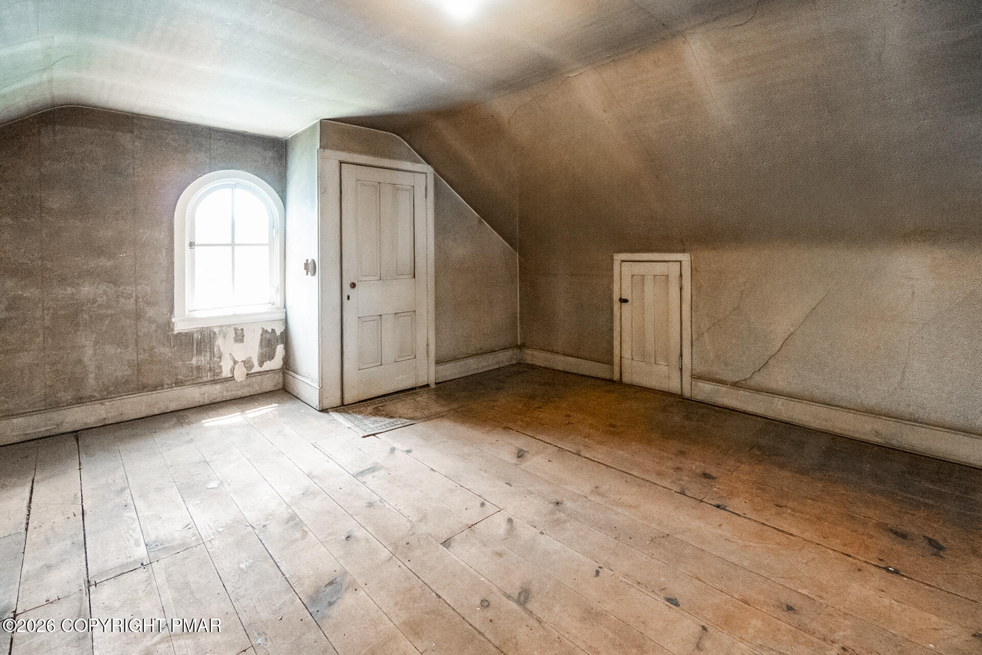 11 East Front Street Jim Thorpe, PA 18229 - Photo 62 of 63 a view of a livingroom with wooden floor and a window