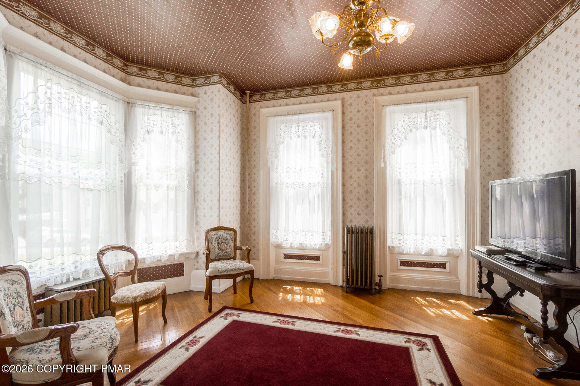 11 East Front Street Jim Thorpe, PA 18229 - Photo 10 of 63 a bedroom with furniture and a flat screen tv