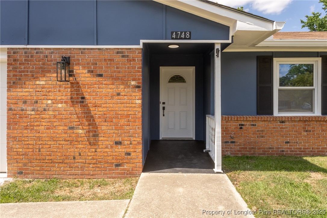 4748 Old Spears Road Fayetteville, NC 28304 - Photo 2 of 37 a view of front door of house
