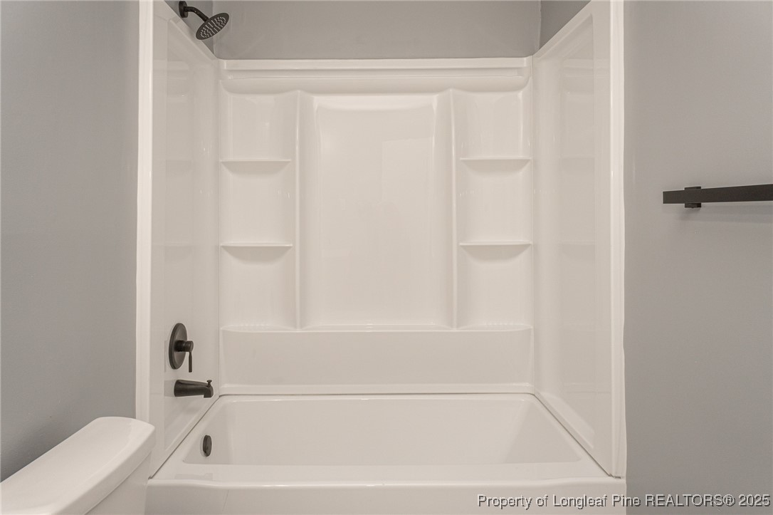 4748 Old Spears Road Fayetteville, NC 28304 - Photo 25 of 37 a bathroom with a bathtub